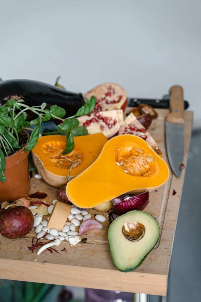 Photo of Fruits and Vegetables on a Chopping Board